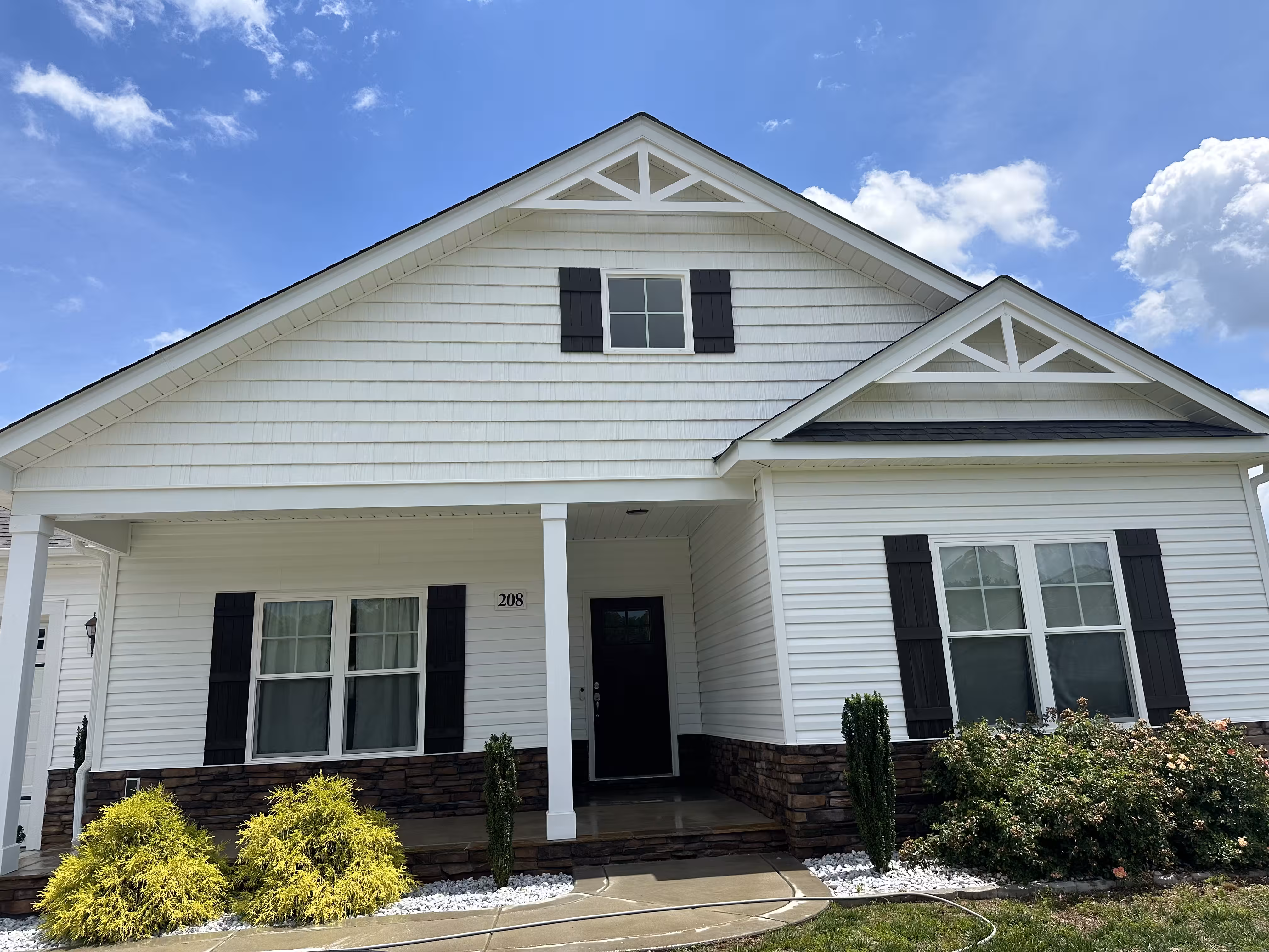 Clean home exterior after professional pressure washing